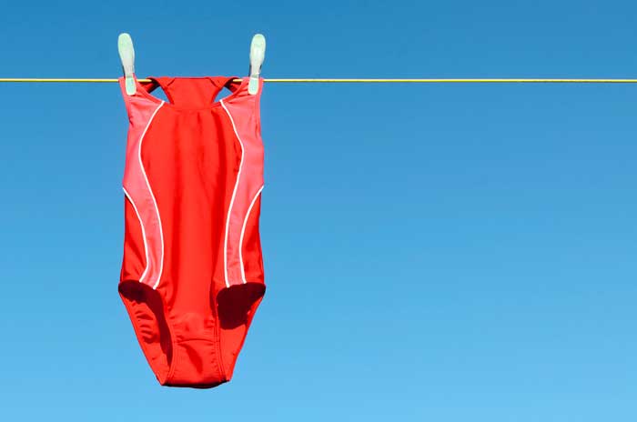 Bathing suit hanging on a clothes line.